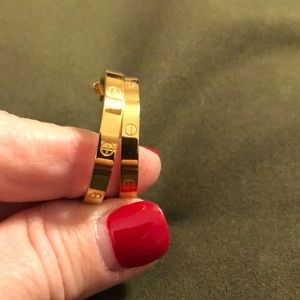 Gold fashion designer hoop earrings cartier